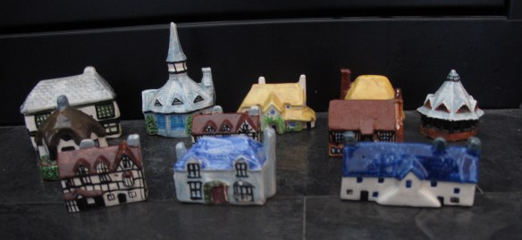 Screamingly irrelevant photo: A couple of people asked what the china cottages I wrote about looked like, and what I did with the ones I didn't send to my friend. Here are the ones I have left.