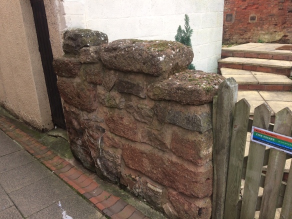 A rare relevant photo: A bit of Roman wall, now fencing off someone's garden in Exeter.